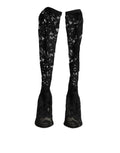 Chaussures Dolce & Gabbana Taormina en cuir noir avec chaussettes en dentelle, bottines élégantes et sophistiquées.