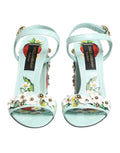 Sandales à talons Dolce & Gabbana vert menthe avec motifs floraux et brides, vue de face.