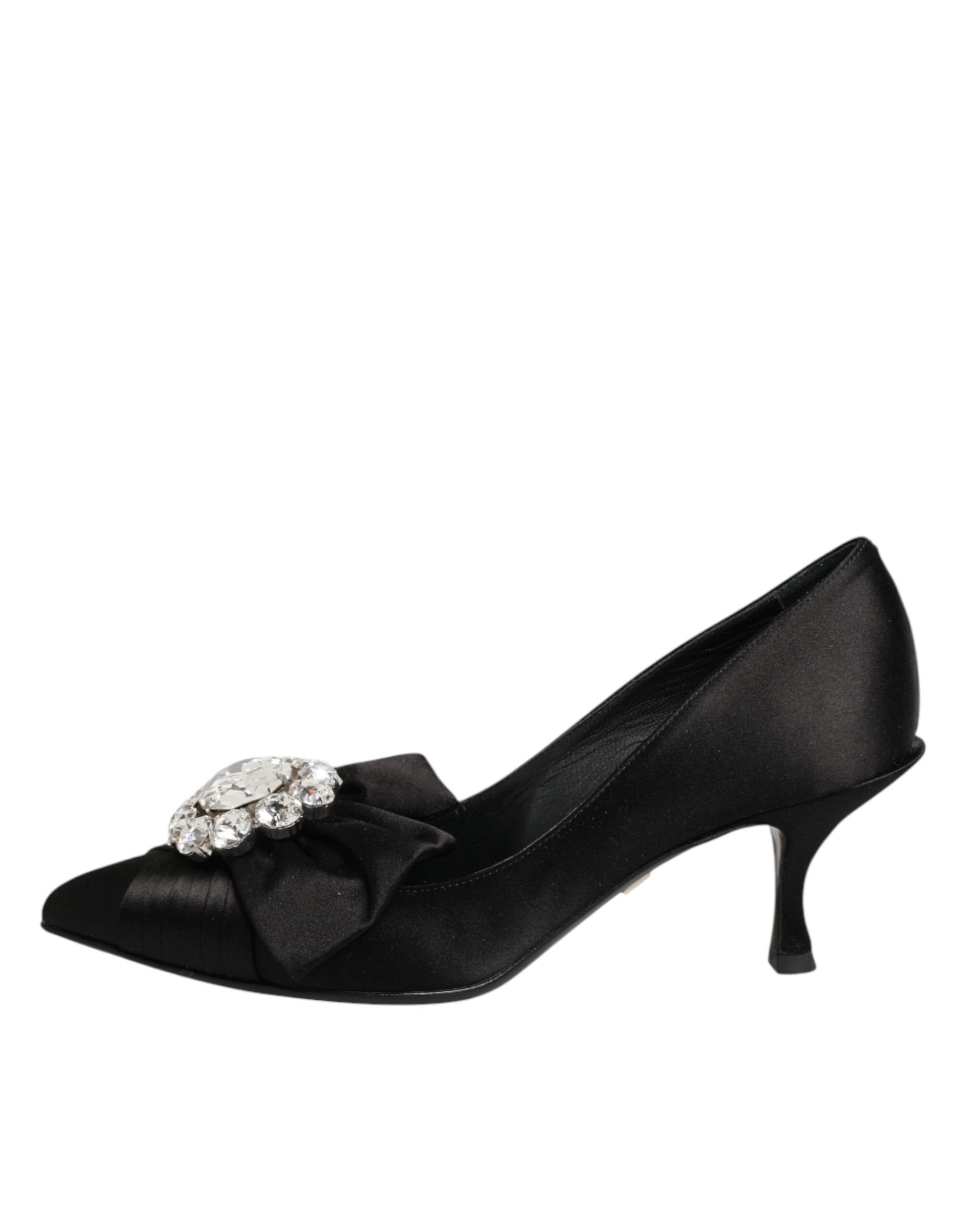 Chaussures Dolce & Gabbana à talons en satin noir avec nœud en satin et embellissements en cristal, style élégant et sophistiqué.