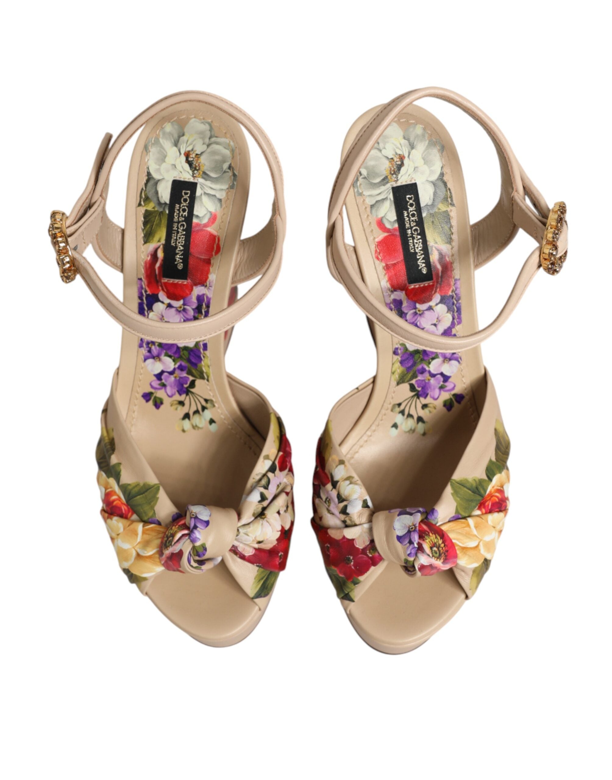 Sandales compensées Dolce & Gabbana beige à fleurs, avec bride à la cheville, style élégant et estival.