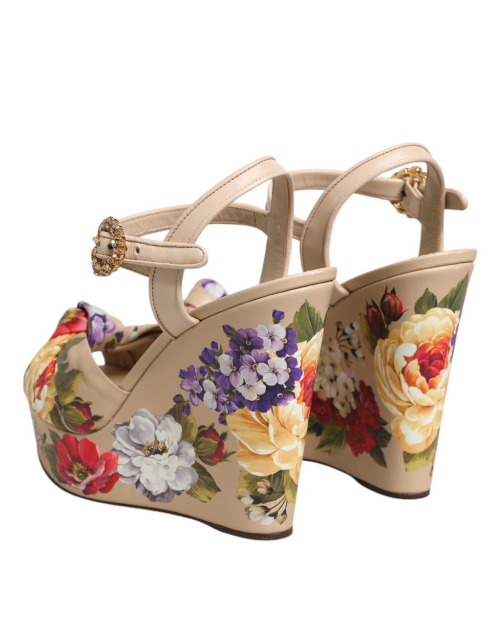 Sandales compensées beiges Dolce & Gabbana avec bride à la cheville et motif floral, vues de côté.