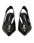 Escarpins noirs en cuir avec fermeture éclair et brides à talons chez Dolce & Gabbana.