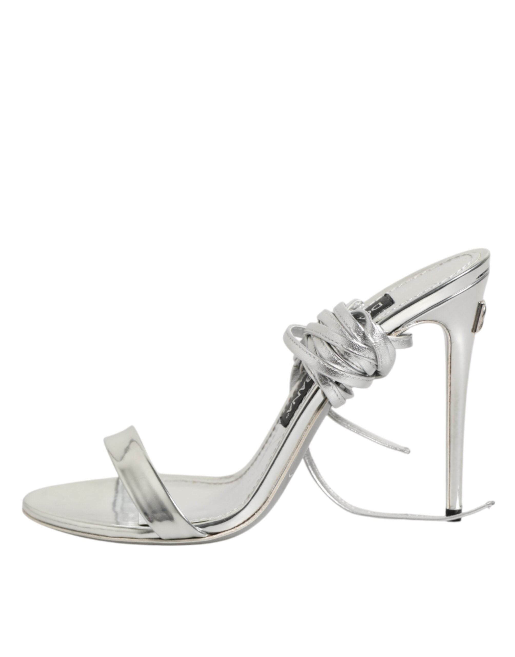 Sandales à talons hauts dorées Dolce & Gabbana avec lanières élégantes et finition métallique argentée, vue de côté.