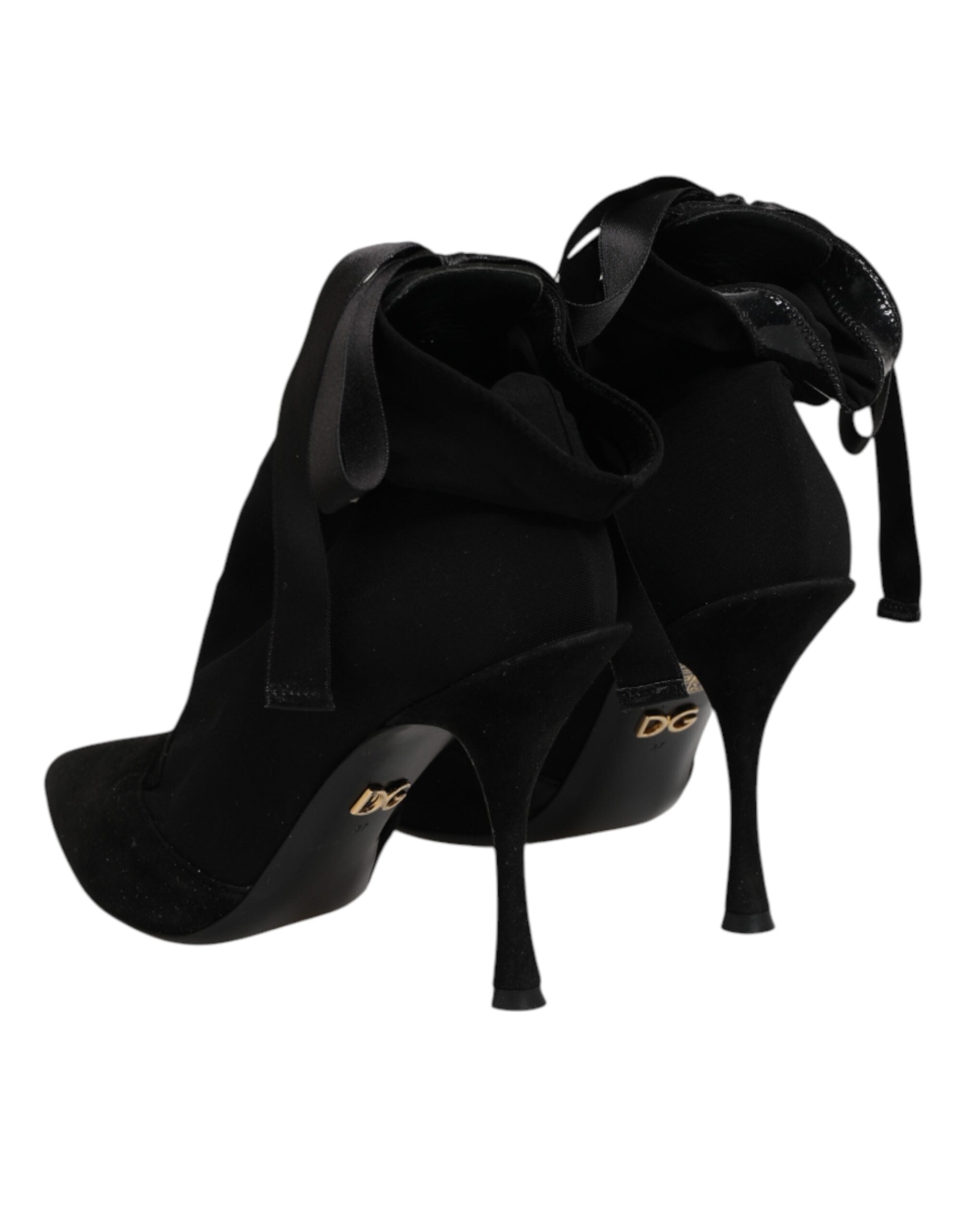 Chaussures Dolce & Gabbana, bottines noires à talons stilettos et lacets, en cuir élégant et sophistiqué.