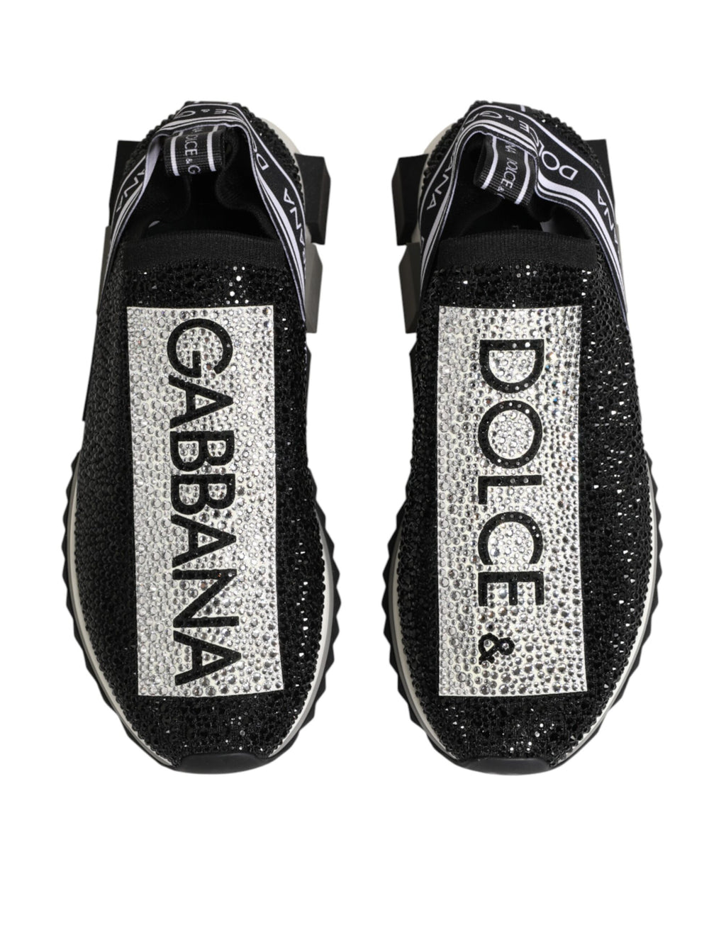 Chaussures Dolce & Gabbana Sorrento noires et argentées, sneakers slip-on élégants avec design moderne et détails métalliques.