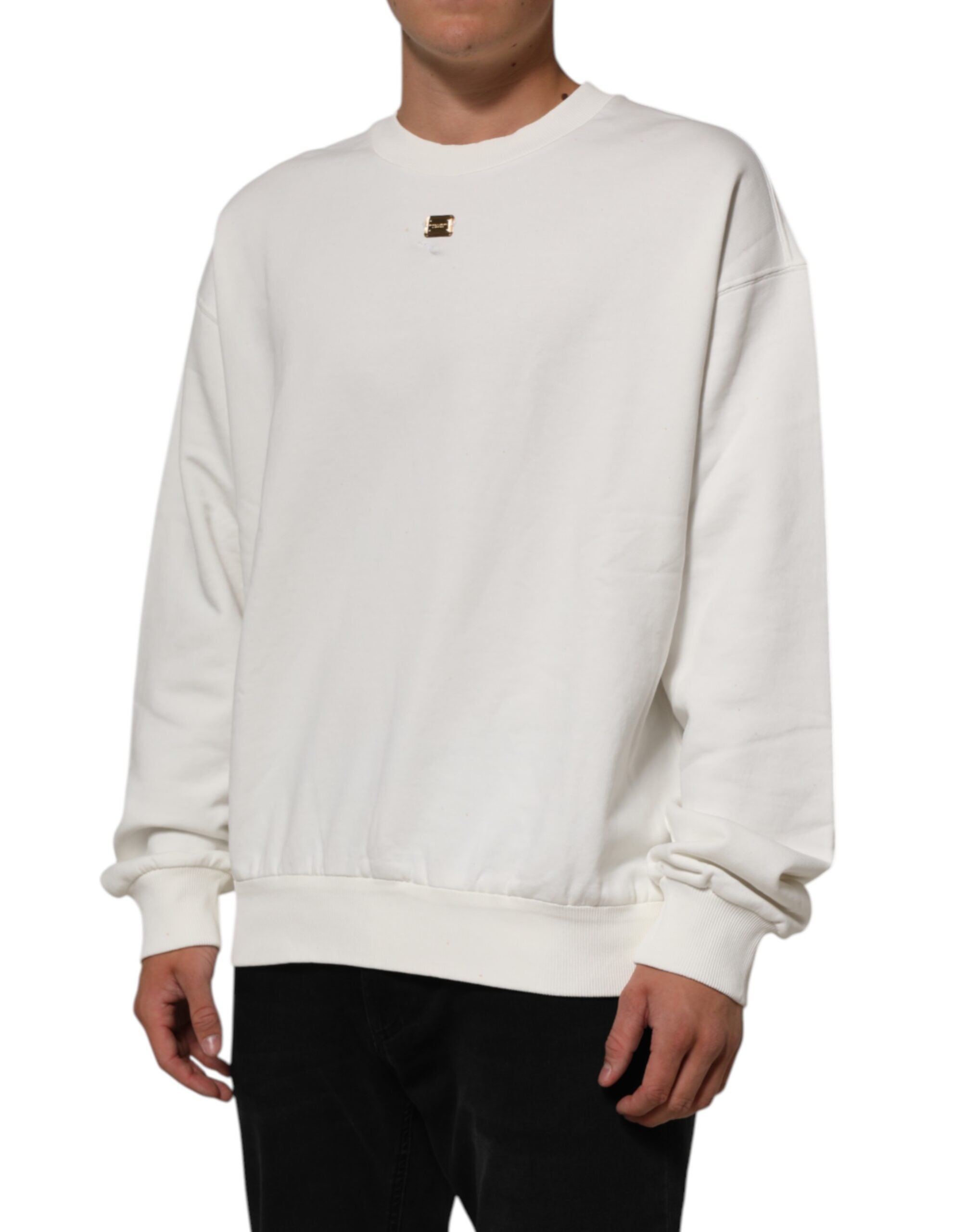 Sweat-shirt Dolce & Gabbana blanc avec logo DG, col rond, en coton, porté sur modèle.
