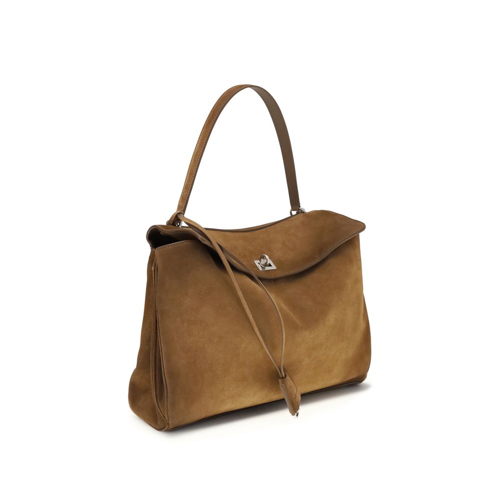 Sac à main Balenciaga en cuir de veau marron Bos Taurus, sac d'épaule élégant et spacieux.