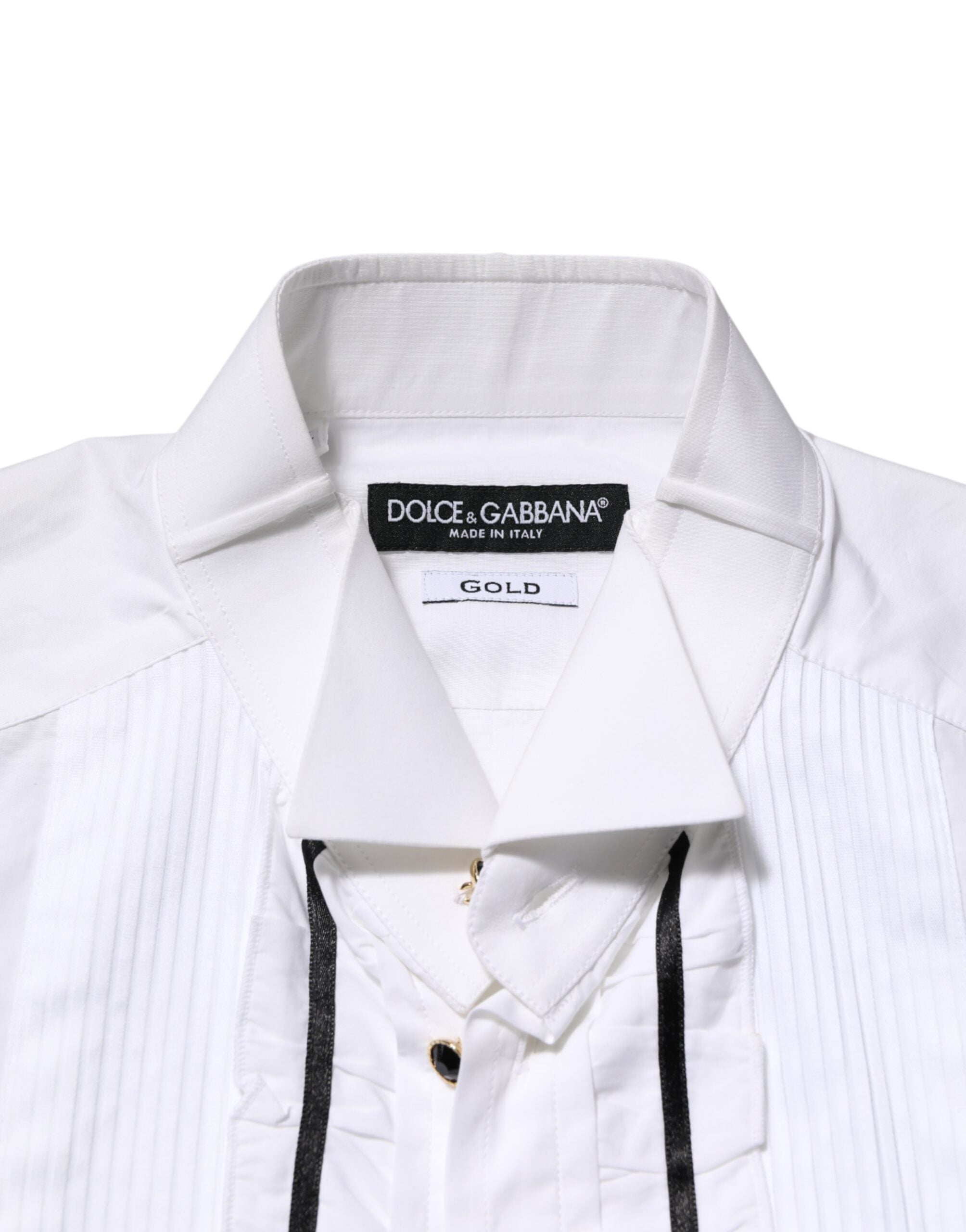 Chemise Dolce & Gabbana en coton blanc à col, manches longues avec détails dorés, élégante robe-shirt pour femmes.