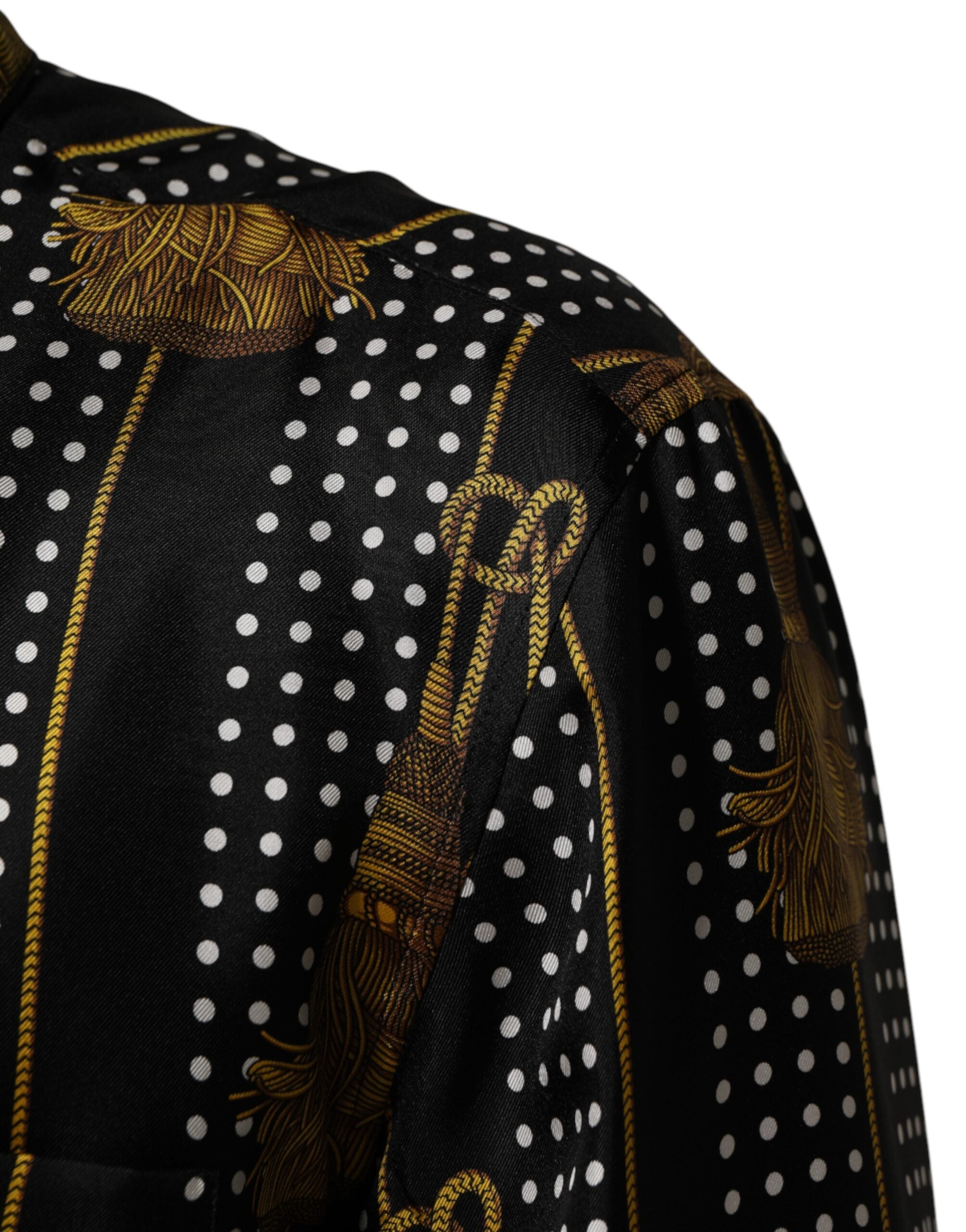 Chemise Dolce & Gabbana en soie noire à pois et pompons, boutons devant, style élégant et sophistiqué.