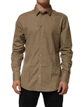 Chemise homme Dolce & Gabbana en coton marron avec col, design élégant et boutonnière dorée visible sur l'image.