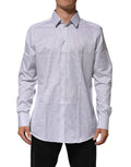 Chemise blanche en coton à rayures pour homme Dolce & Gabbana, style élégant avec détails dorés.