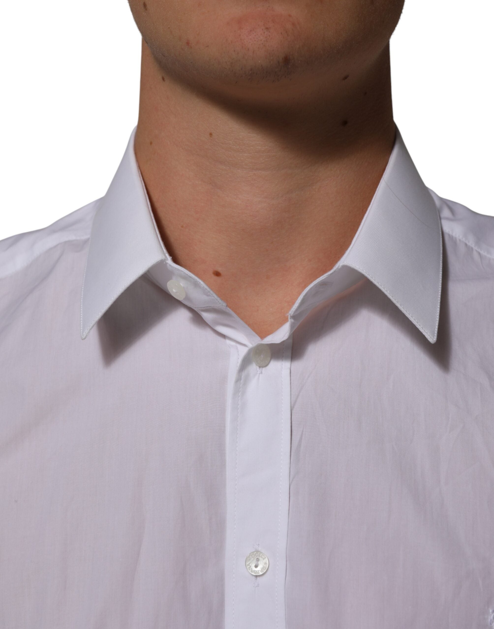 Chemise blanche en coton pour homme Dolce & Gabbana, col classique et coupe élégante, idéale pour un style sophistiqué.