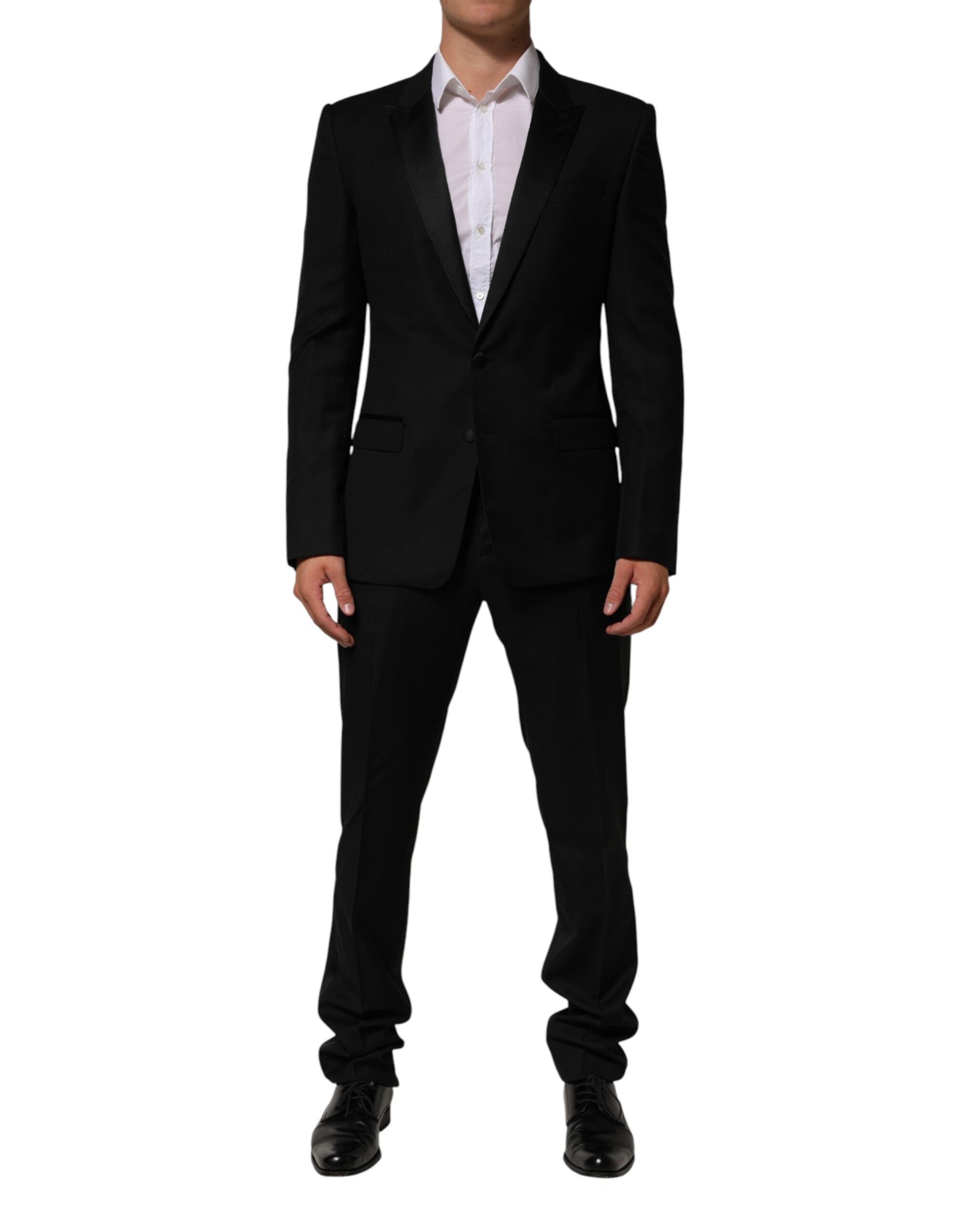 Veste noire Dolce & Gabbana avec deux boutons, costume deux pièces formel, détail du vêtement élégant et chic.