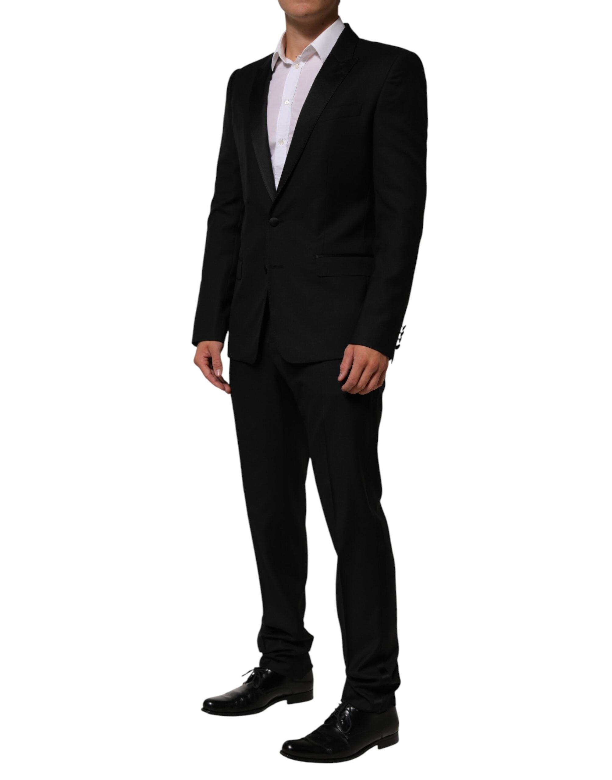 Costume formel deux pièces noir Dolce & Gabbana avec veste à deux boutons et pantalon ajusté, élégant et sophistiqué.
