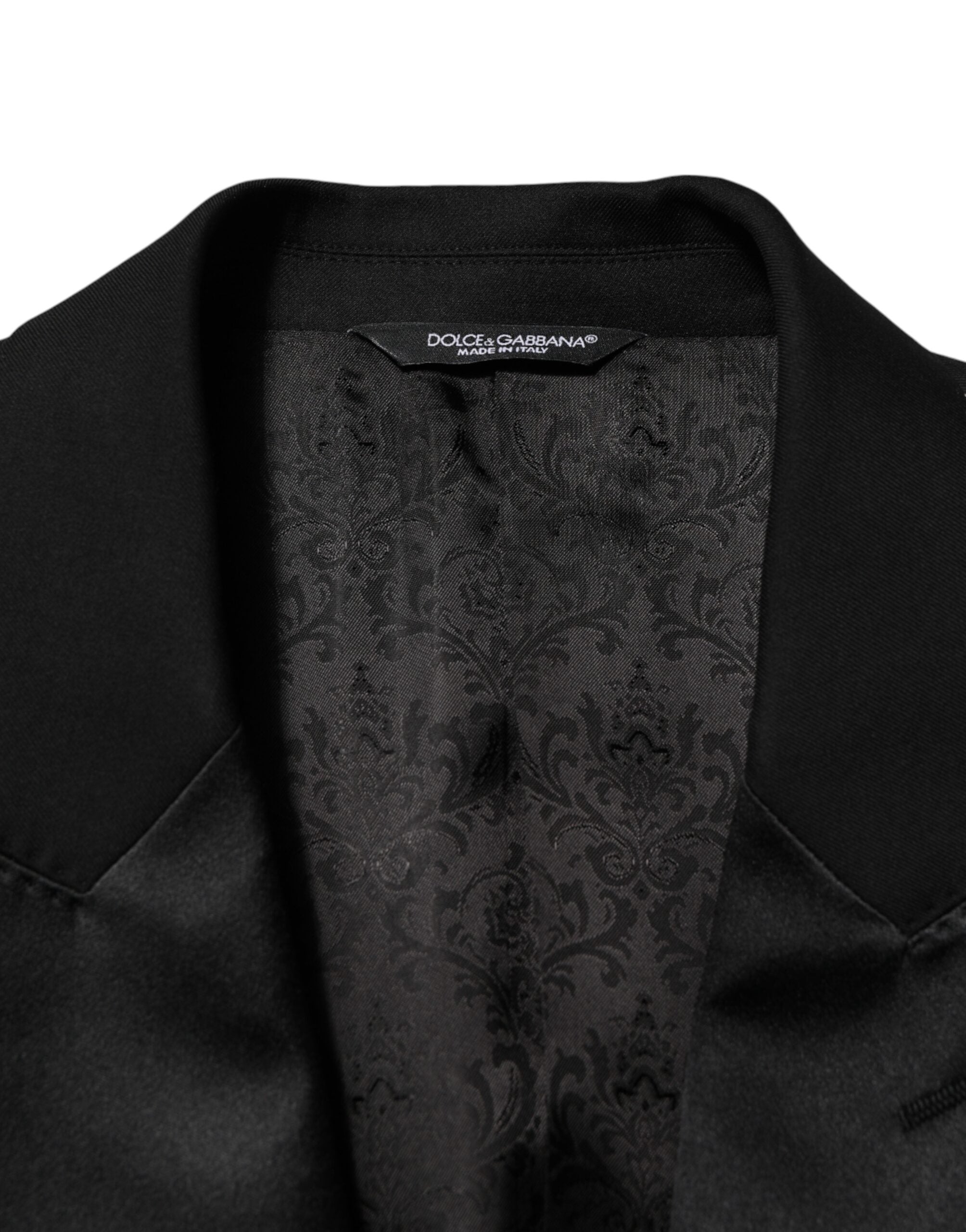 Costume formel homme Dolce & Gabbana, veste noire à deux boutons avec pantalon assorti, élégant et sophistiqué.
