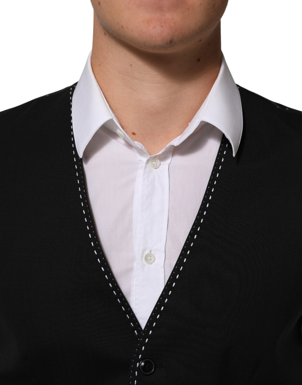 Gilet en laine noir Dolce & Gabbana pour homme, costume formel, ajusté et élégant, porté sur une chemise blanche.