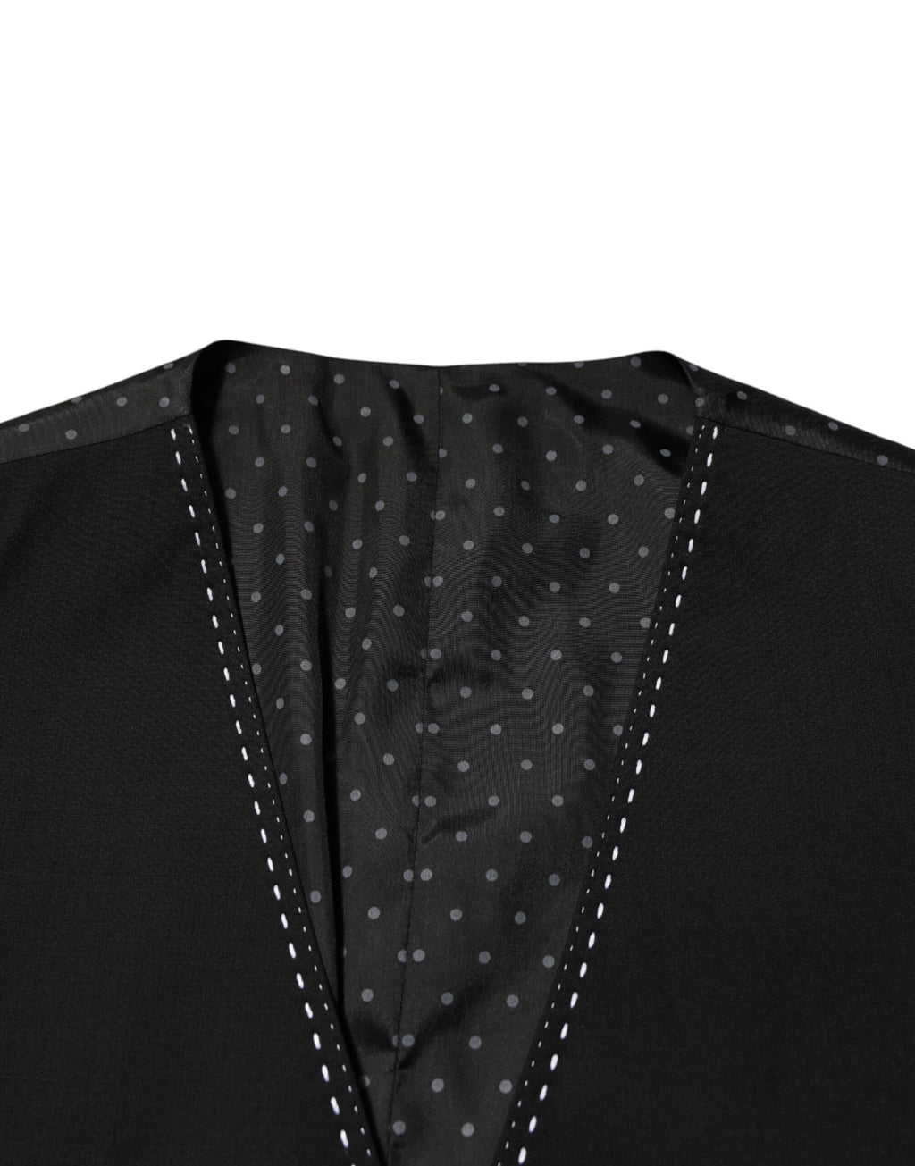 Gilet de costume en laine noire Dolce & Gabbana pour homme, élégant et formel, porté sur un costume.