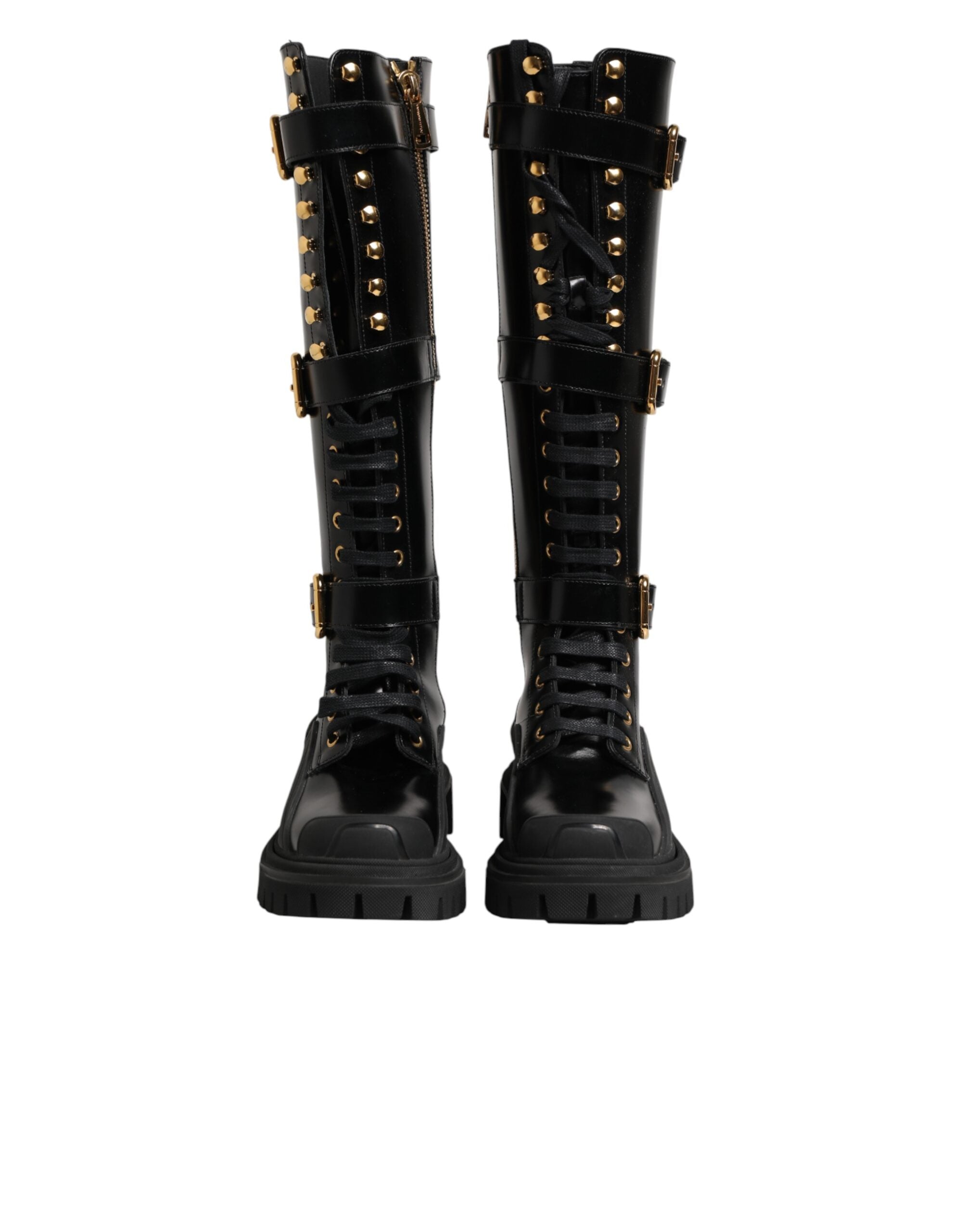 Bottes hautes noires Dolce & Gabbana avec boucle ornée et embellissements, en cuir élégant et sophistiqué.