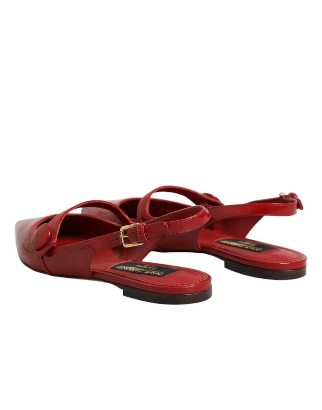 Sandales Dolce & Gabbana en cuir rouge avec talon slingback et semelle élégante, parfaites pour un look sophistiqué.