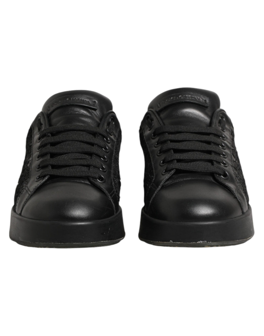 Chaussures sneakers basses Dolce & Gabbana en dentelle florale noire, élégantes et modernes, vues de face.