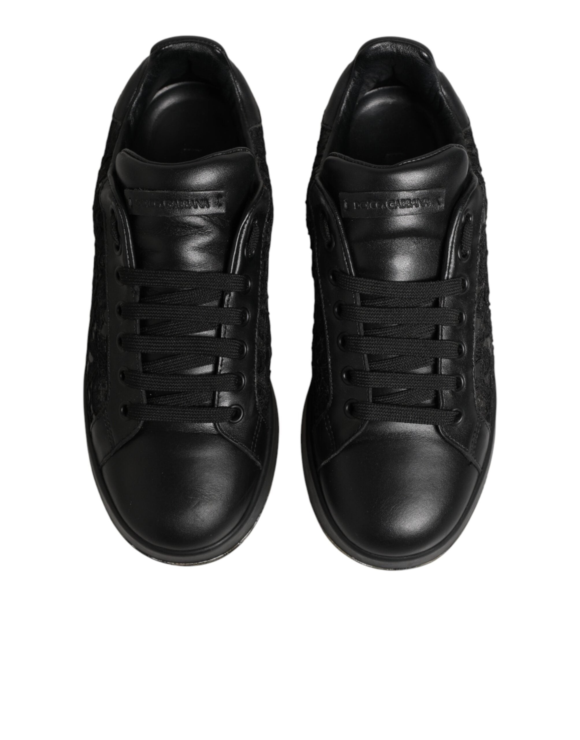 Chaussures basses Dolce & Gabbana en dentelle florale noire, sneakers élégants en tissu avec semelle blanche.