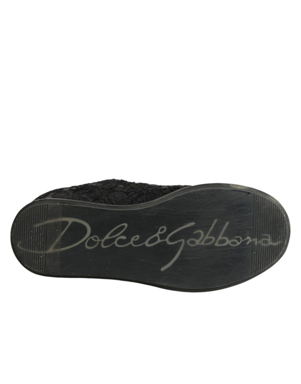 Chaussures basses Dolce & Gabbana en dentelle florale noire, sneakers élégants avec design raffiné et détails en dentelle.