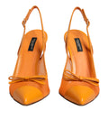 Chaussures Dolce & Gabbana à talons en mesh orange avec bride arrière, style élégant et sophistiqué.