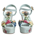 Sandales à talons compensés Dolce & Gabbana vertes avec bride à la cheville et motif floral, vues de côté.
