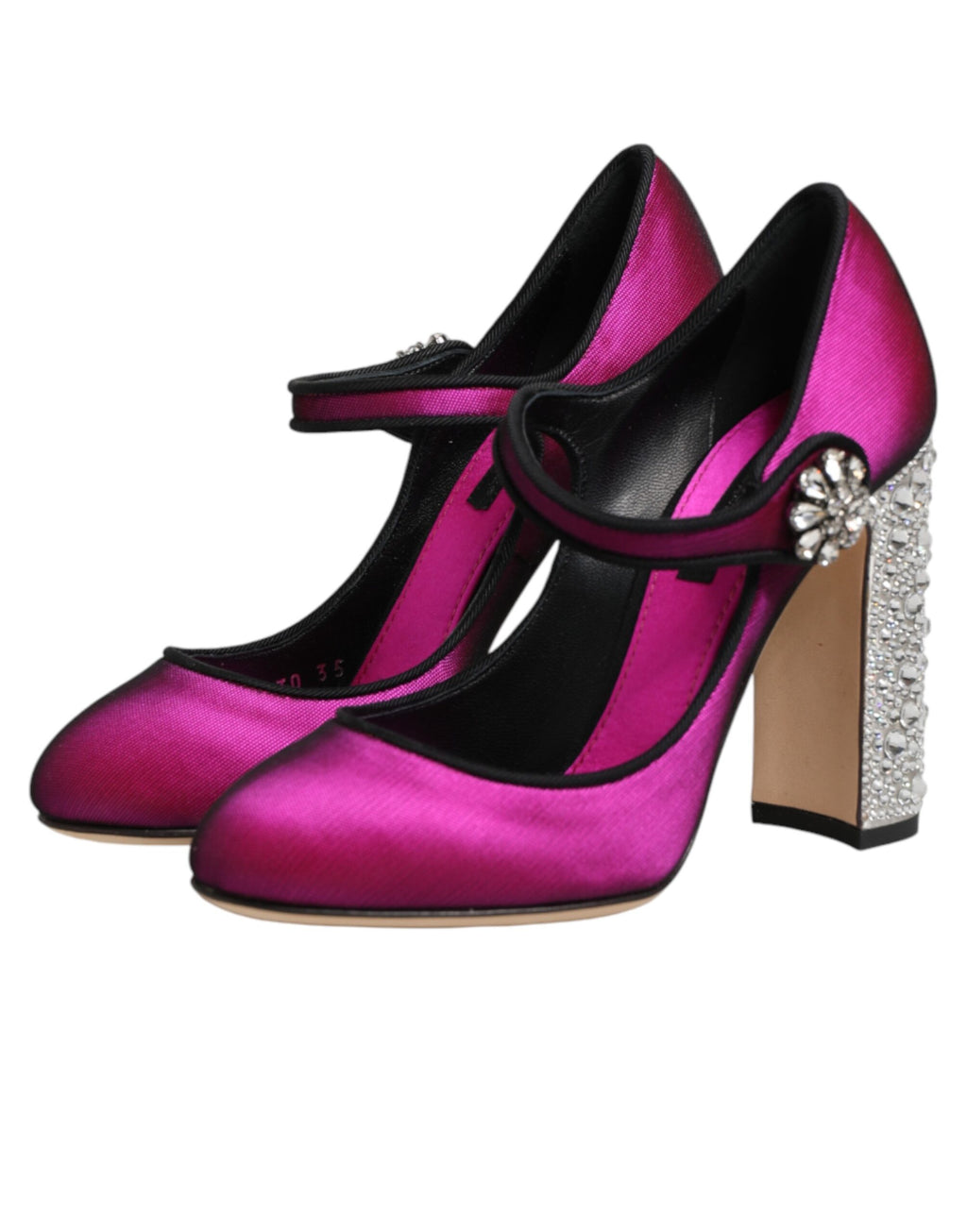 Escarpins à talons hauts roses Dolce & Gabbana ornés de perles et embellissements, chaussures élégantes en cuir avec finitions raffinées.