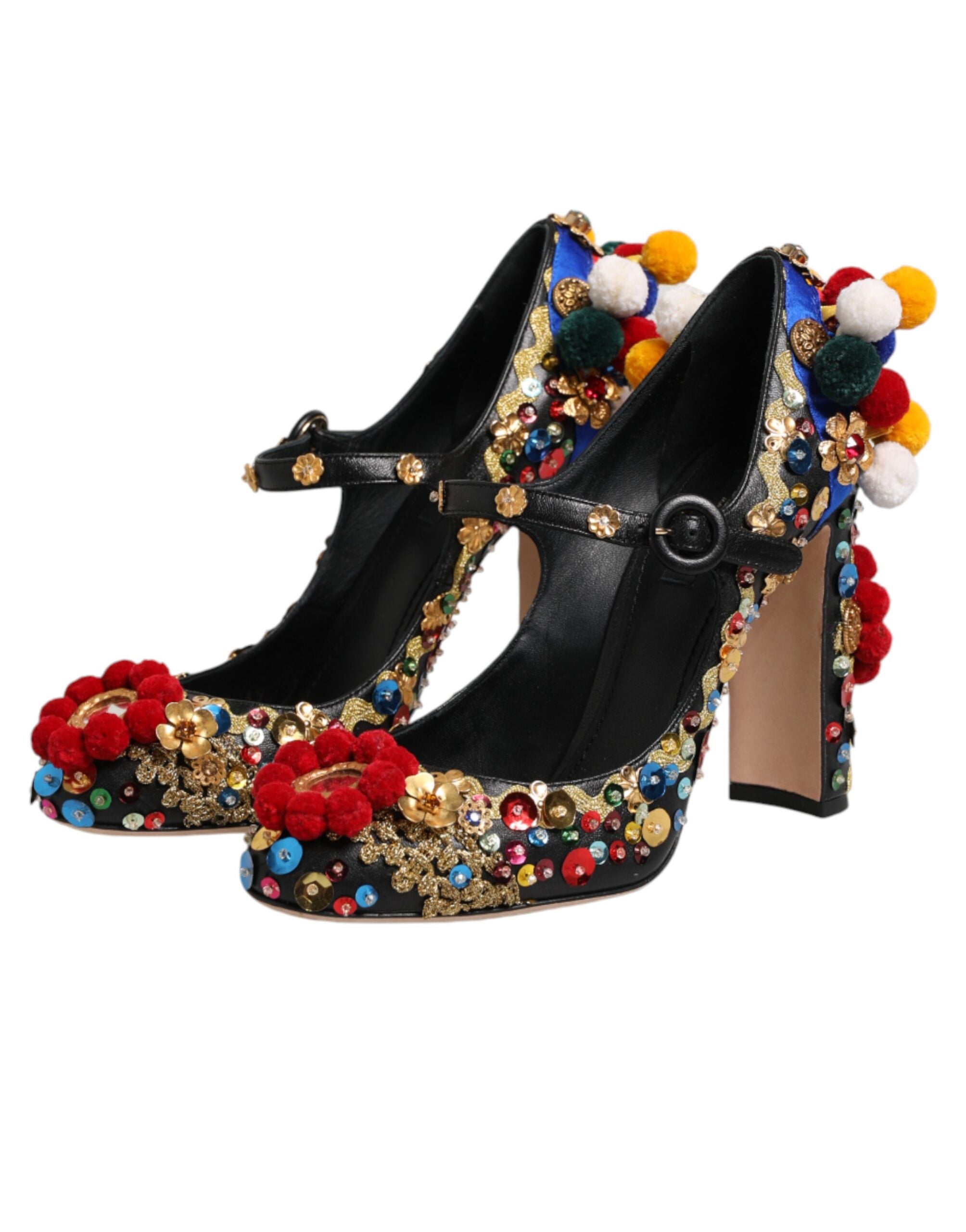 Chaussures Dolce & Gabbana Mary Janes noires avec embellissements dorés, style élégant et sophistiqué.