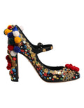 Chaussures Dolce & Gabbana Mary Janes noires avec embellissements dorés, style élégant et sophistiqué.