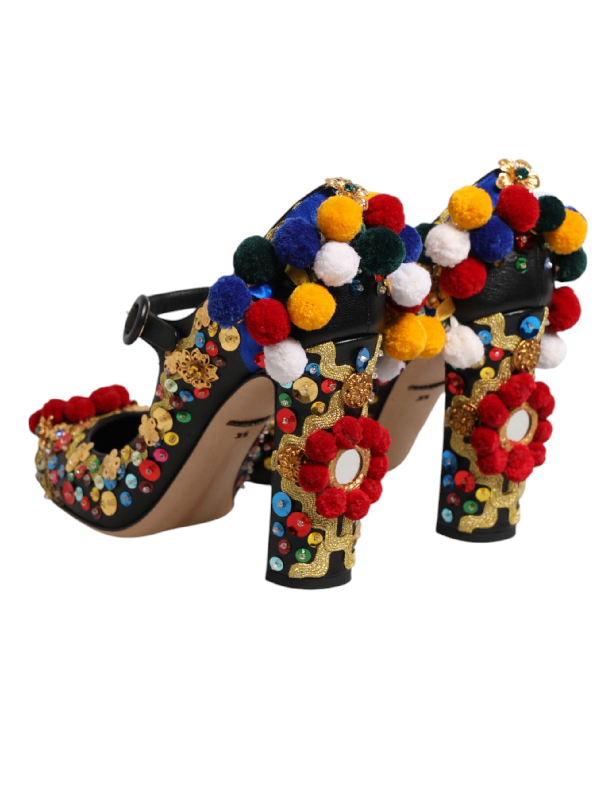 Chaussures Mary Janes Dolce & Gabbana noires et or, pompes élégantes avec embellissements brillants.