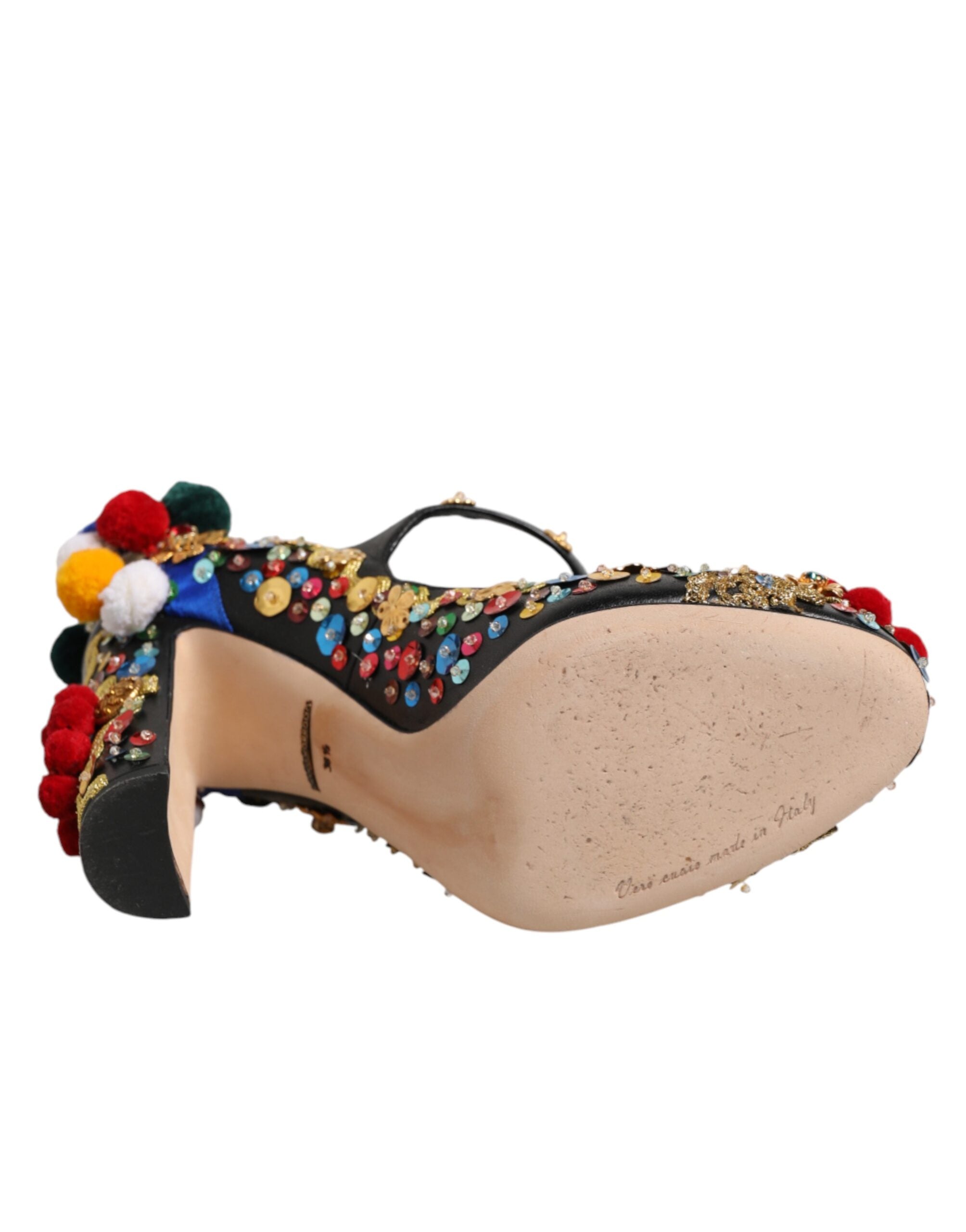Chaussures Dolce & Gabbana Mary Janes noires avec embellissements dorés, style élégant et sophistiqué.