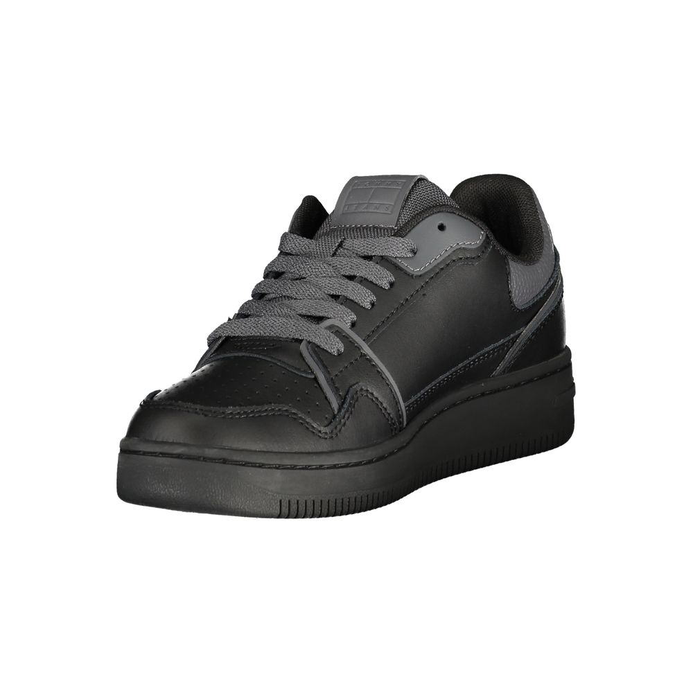 Basket femme Tommy Hilfiger en polyuréthane noir, style sporty avec semelle blanche et design moderne.