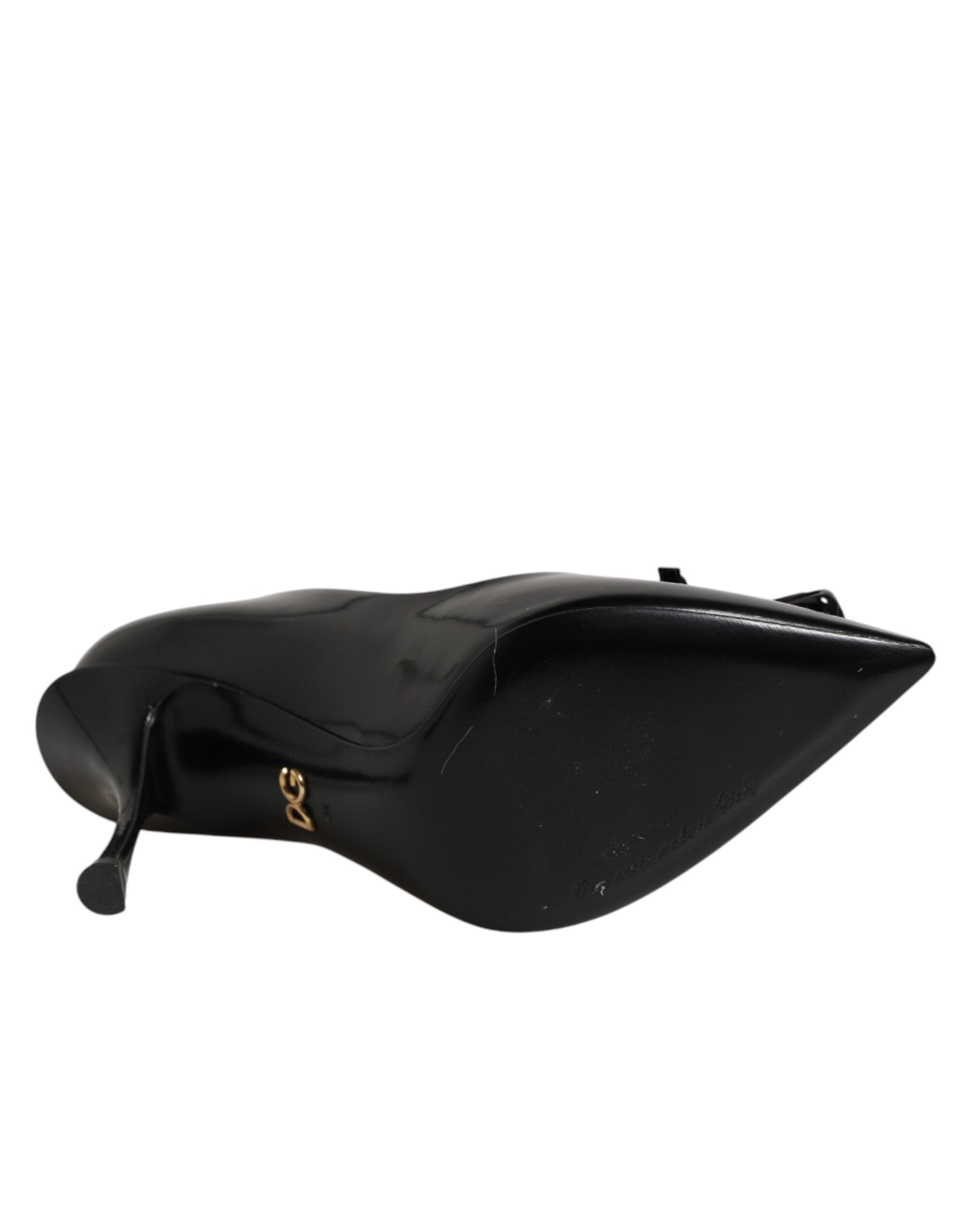 Chaussures Dolce & Gabbana à talons noirs avec embellissements, pompe élégante en cuir pour femmes.