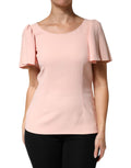 Blouse rose Dolce & Gabbana à manches courtes, col rond, en tissu léger, vue front sur un fond blanc.