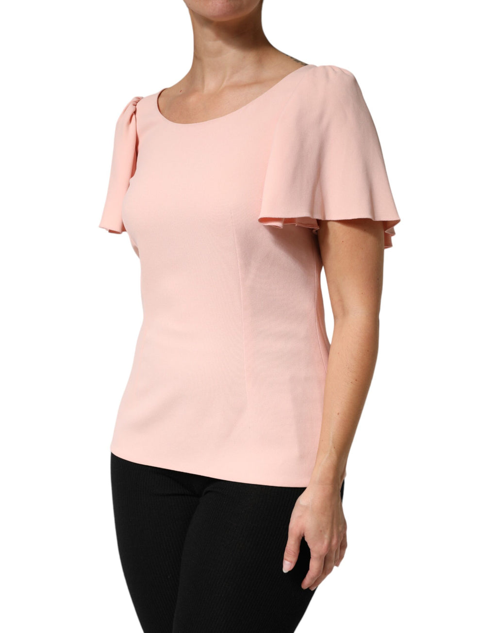 Blouse rose Dolce & Gabbana à manches courtes, col rond, tissu léger, portée décontractée, vue de face.