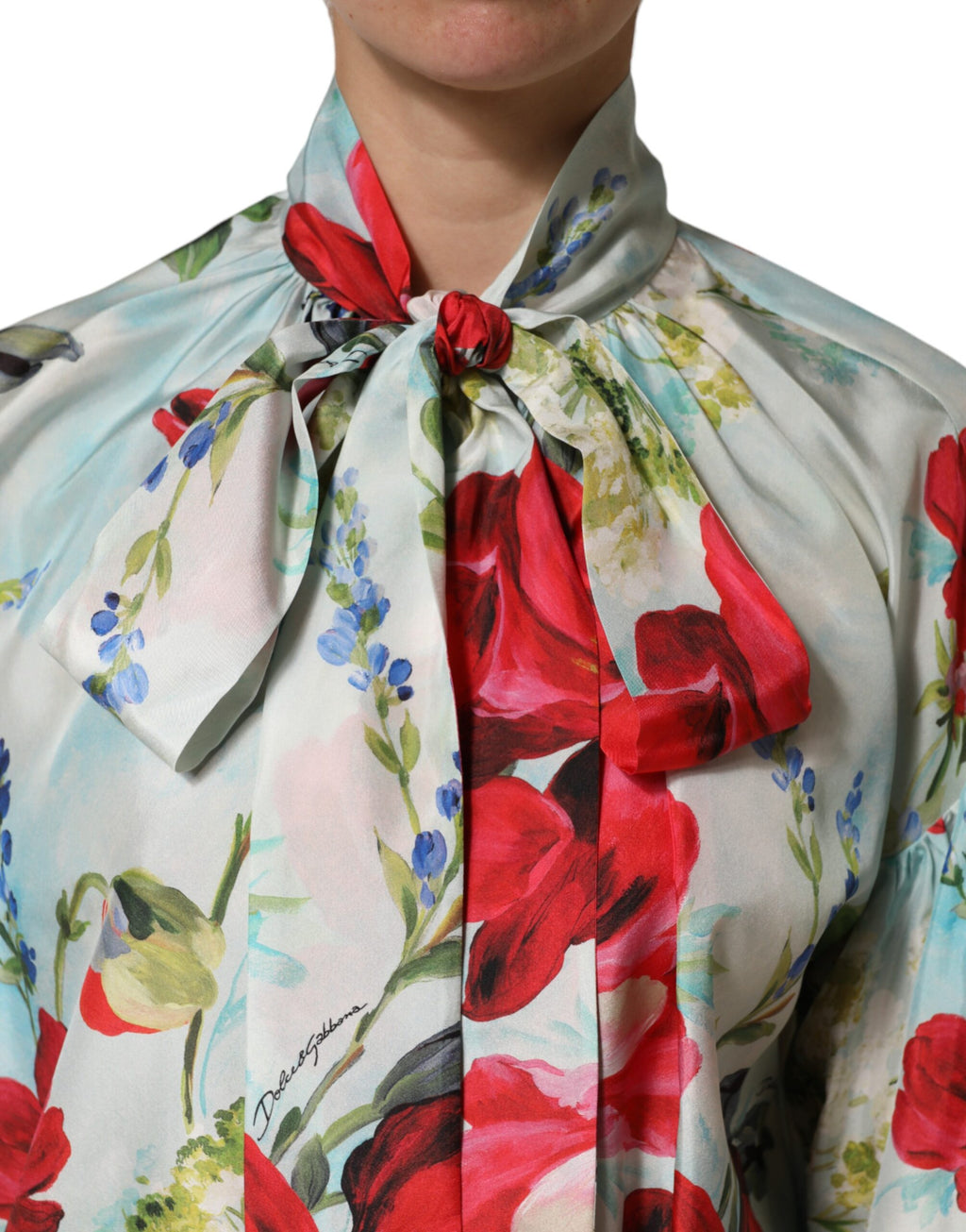 Chemisier à manches longues Dolce & Gabbana à fleurs multicolores, motif floral élégant et style sophistiqué.