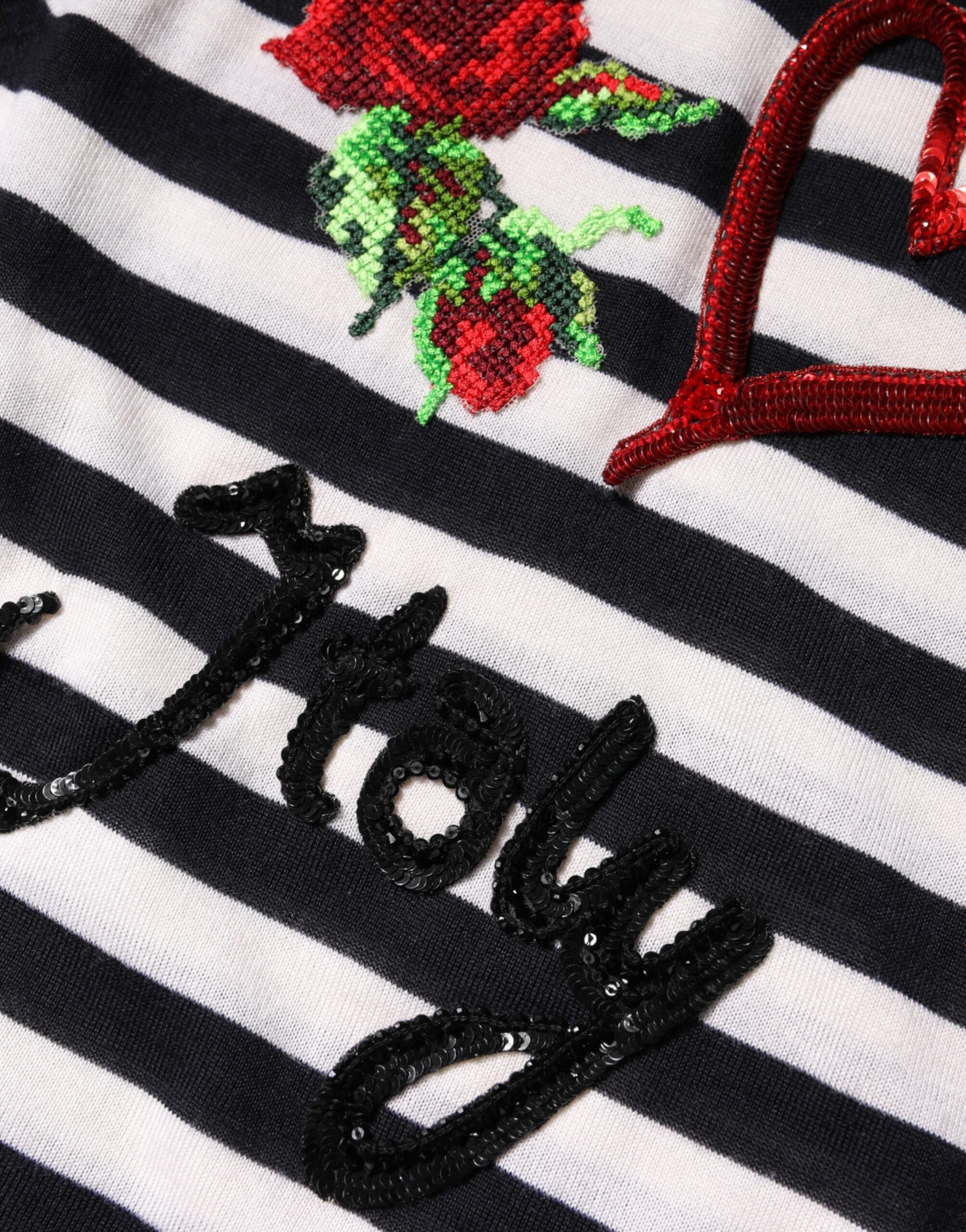 Top sans manches en cachemire et soie noir et blanc de Dolce & Gabbana, vue de face, détails élégants.