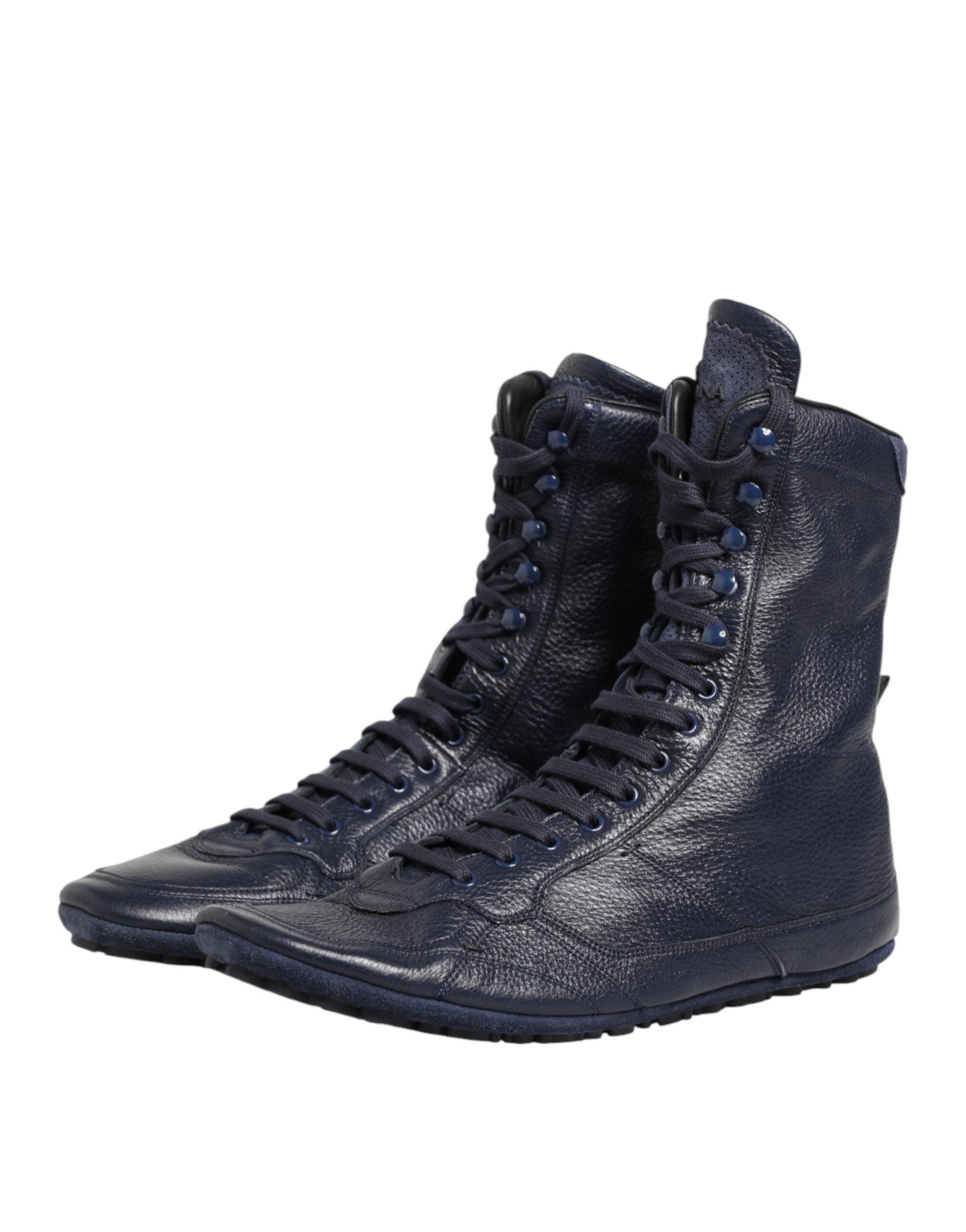 Bottes en cuir de cerf bleu foncé de mi-mollet de Dolce & Gabbana, style élégant et sophistiqué.