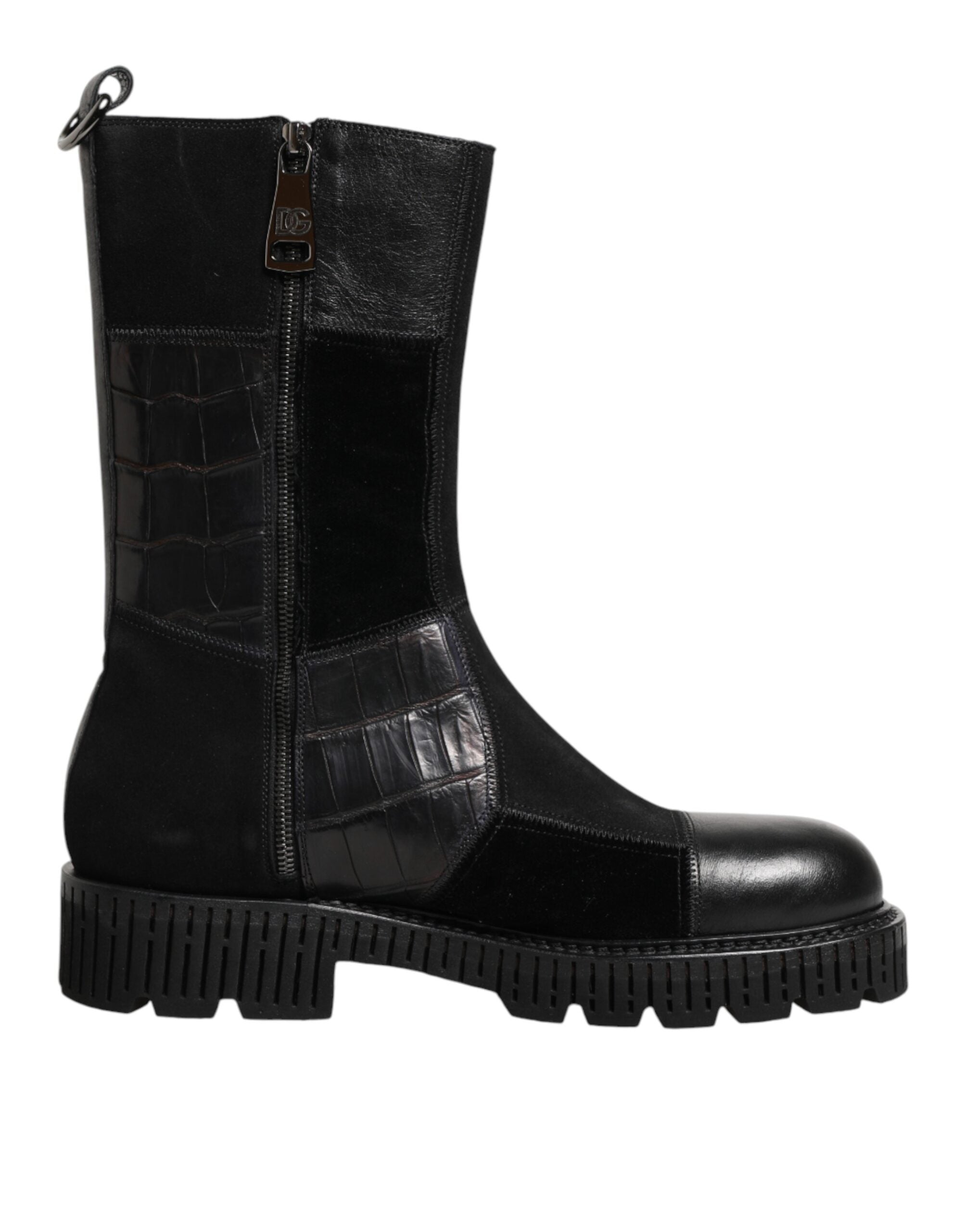 Bottes en cuir noir à patchwork Dolce & Gabbana, mi-mollet, avec design élégant et détails distinctifs.