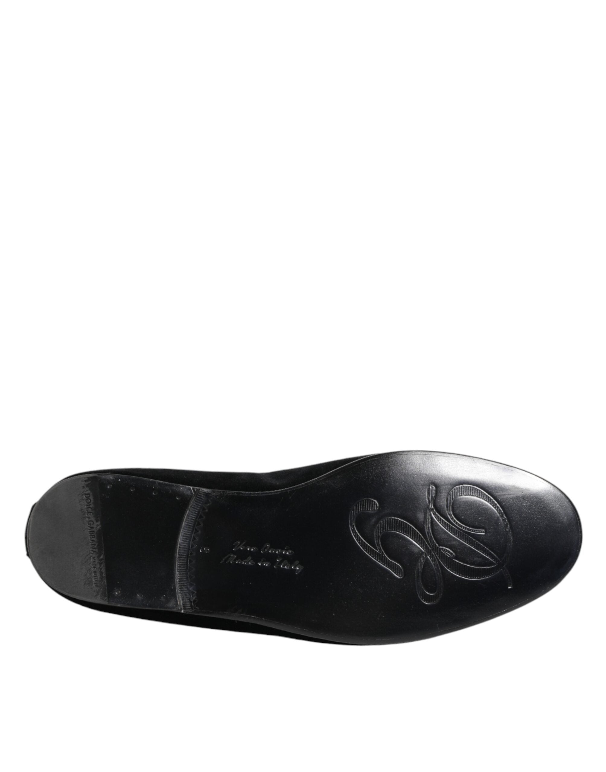 Chaussures loafers pour hommes Dolce & Gabbana en velours noir avec couronne en or, style élégant et sophistiqué.