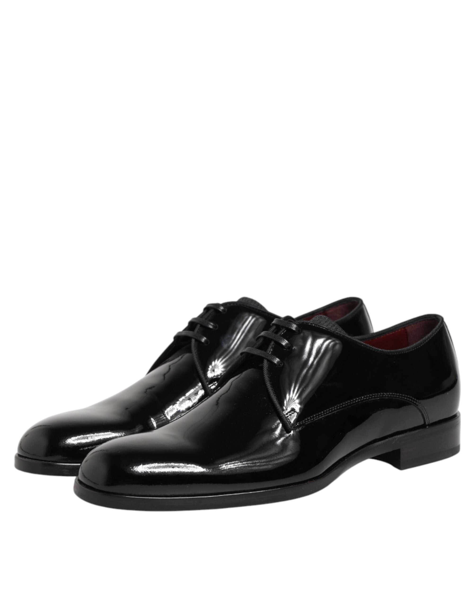 Chaussures Derby en cuir de veau noir de Dolce & Gabbana, élégantes et raffinées, avec lacets et finition lisse.
