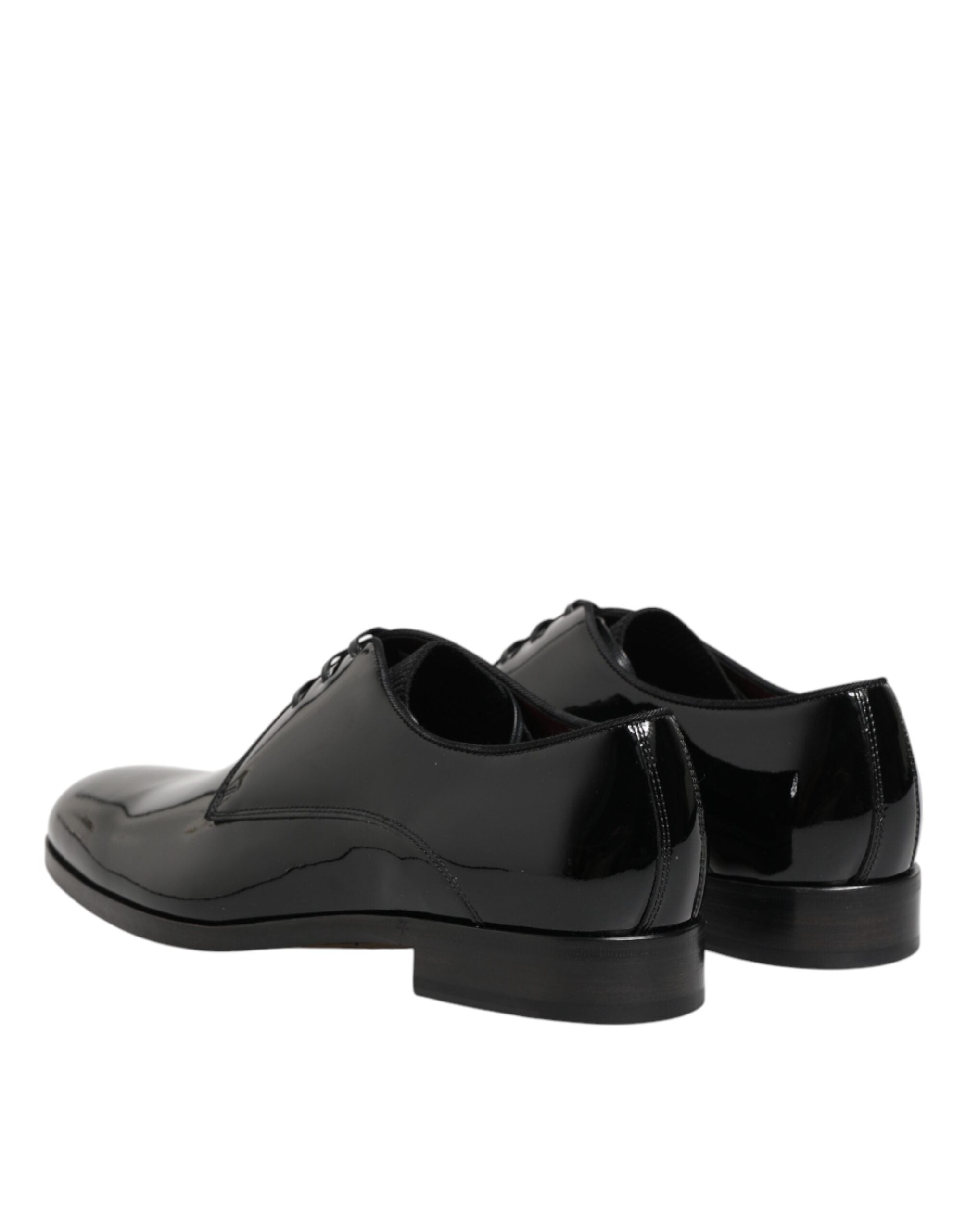 Chaussures Derby en cuir de veau noir Dolce & Gabbana, élégantes et sophistiquées, visibles en gros plan.