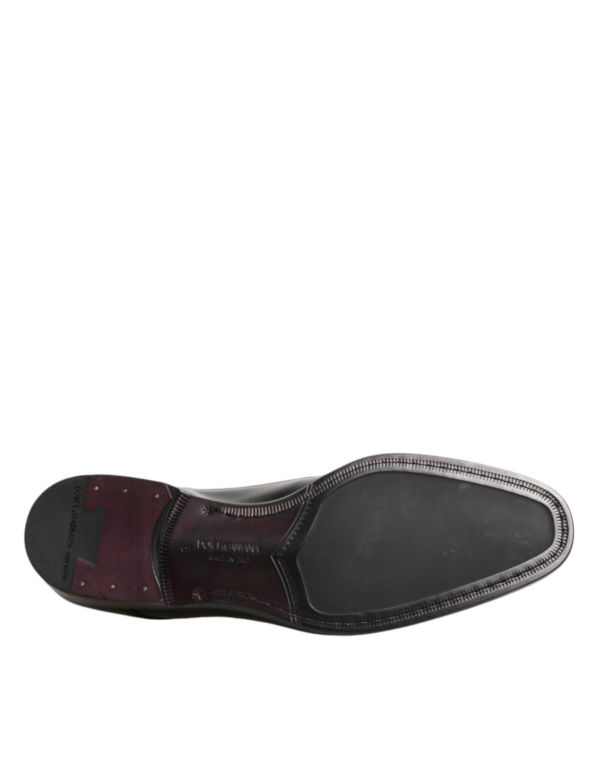 Chaussures Derby en cuir de veau noir de Dolce & Gabbana, élégantes et sophistiquées, pour homme.