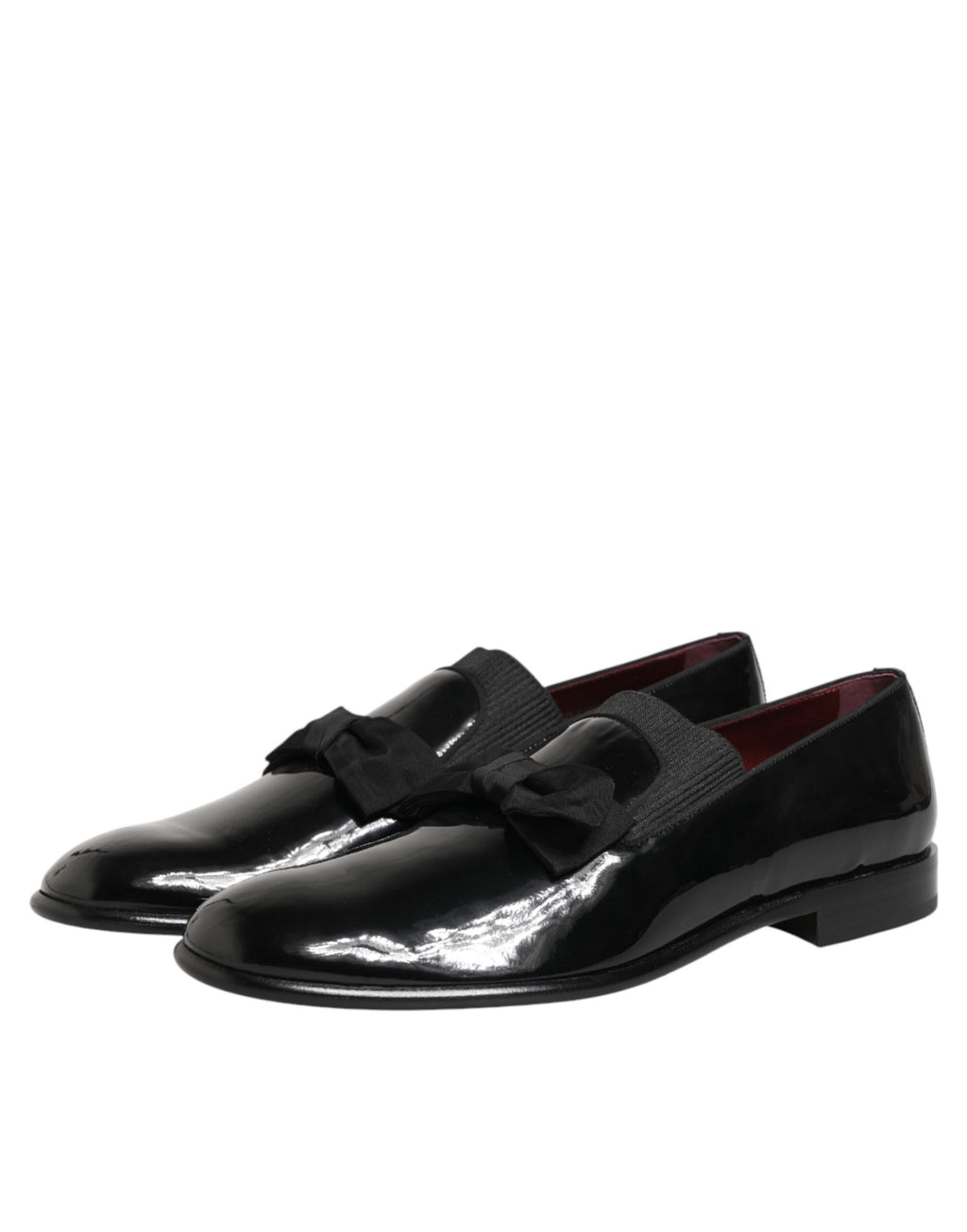 Chaussures mocassins en cuir noir Dolce & Gabbana pour homme, slip-on élégants et confortables.