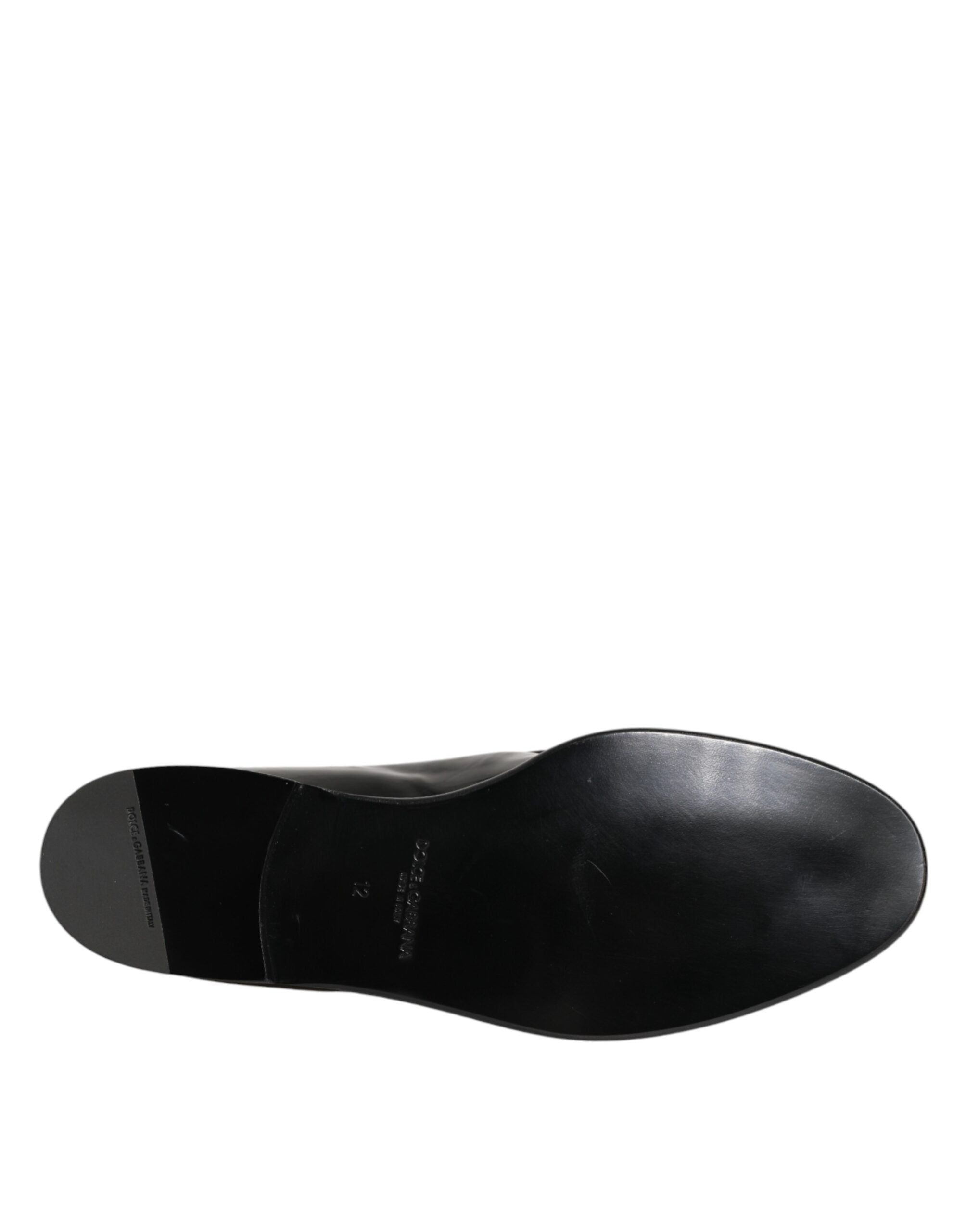 Chaussures hommes Dolce & Gabbana en cuir noir, mocassins slip-on élégants pour un style sophistiqué.