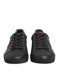 Sneakers en cuir noir Dolce & Gabbana avec embellissements en forme de cœur, chaussures sport élégantes pour femmes.