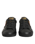 Chaussures sneakers Dolce & Gabbana en cuir noir avec embellissements en forme de cœur, style élégant et tendance.