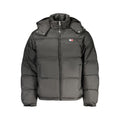 Veste homme Tommy Hilfiger en polyester noire, avec fermeture éclair et col montant, portée sur un fond neutre.